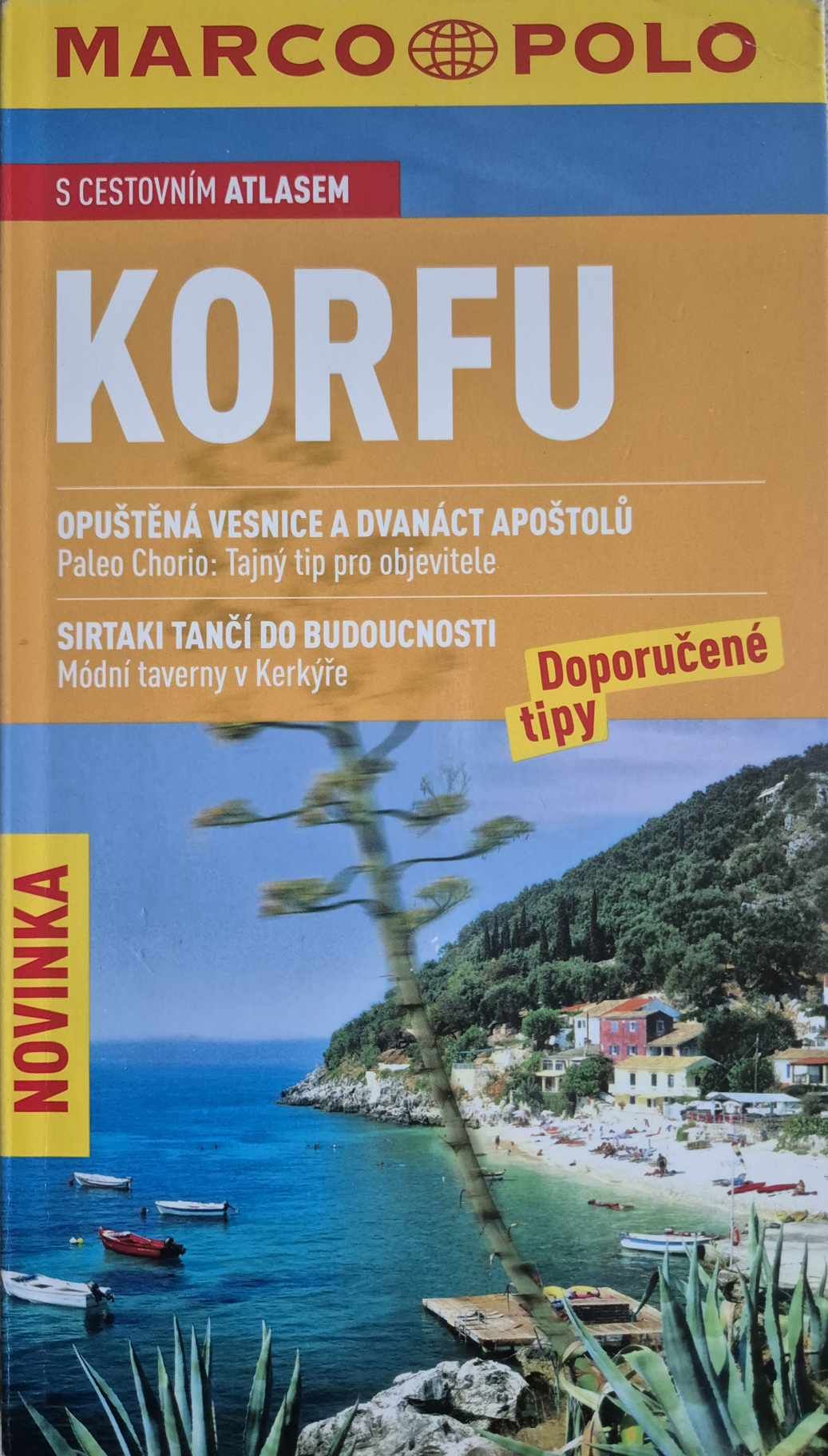 Korfu s cestovním atlasem